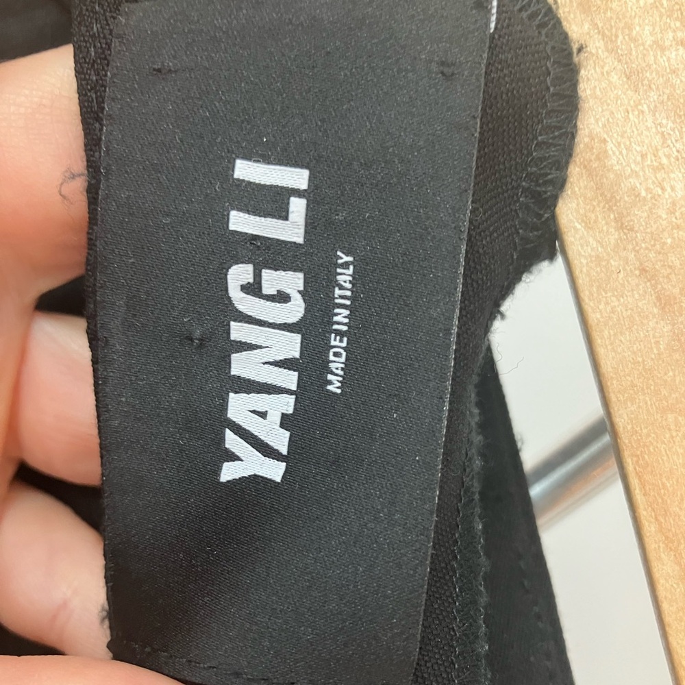 Yang Li wool trousers with live edge detail at back seam. Like new. Size 6.